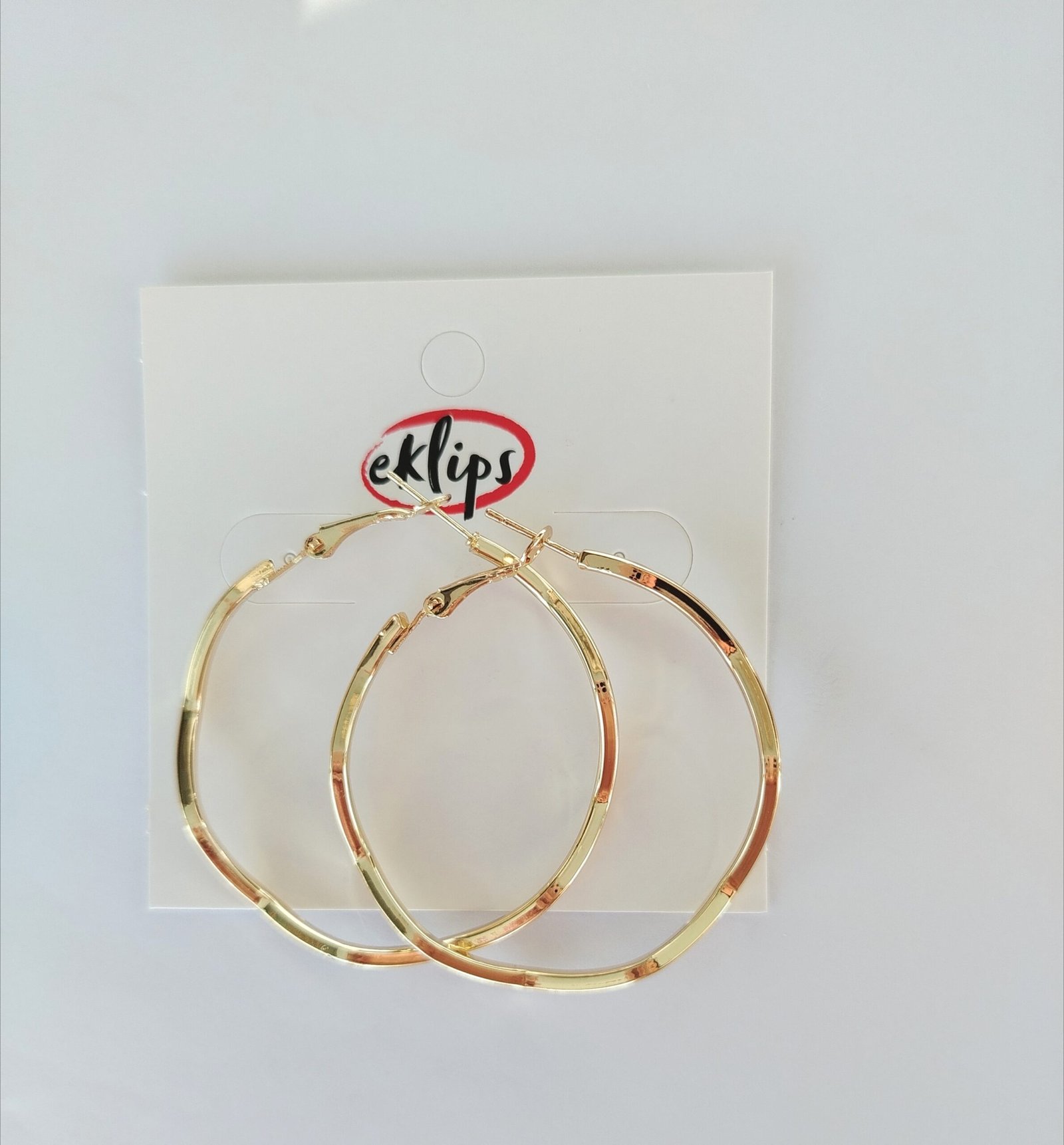 Eklips hexagonal Wavy Hoops earrings